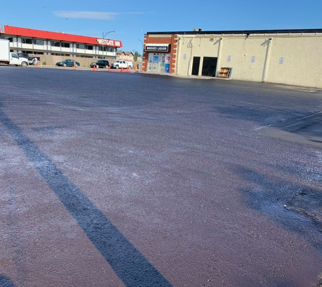 Industrial asphalt jobsite with heavy equipment